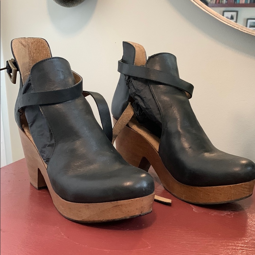 Free People Black Mules with Chunky Heel and Open Back Design. Clogs